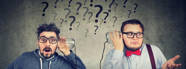 image of two confused looking men trying to use jars connected by a loose string as a phone with question marks floating in the background between them
