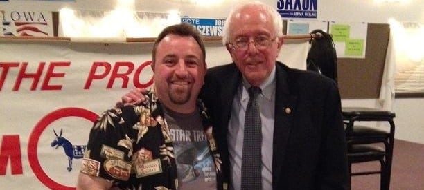 David Soll is next to Bernie at an event