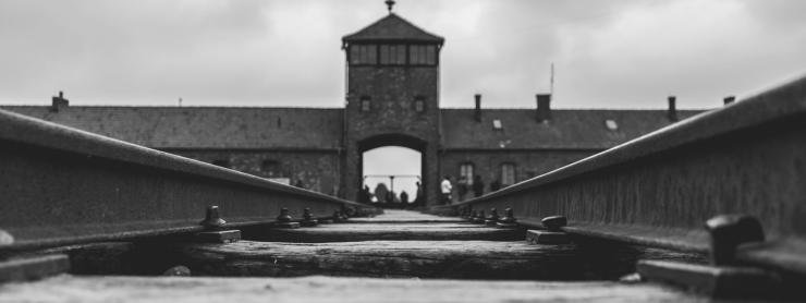 black and white photo of auschwitz concentration camp