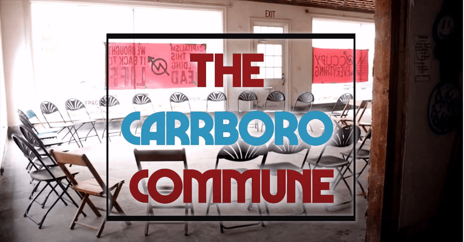 Circle of chairs with the words "The Carrboro Commune" on top
