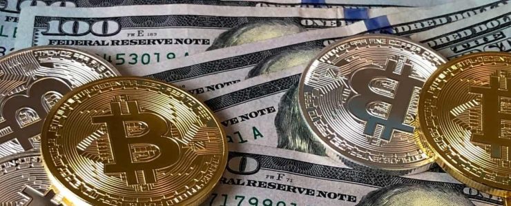 Bitcoins and U.s Dollar Bills