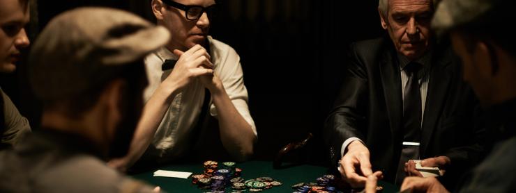 image of men playing poker